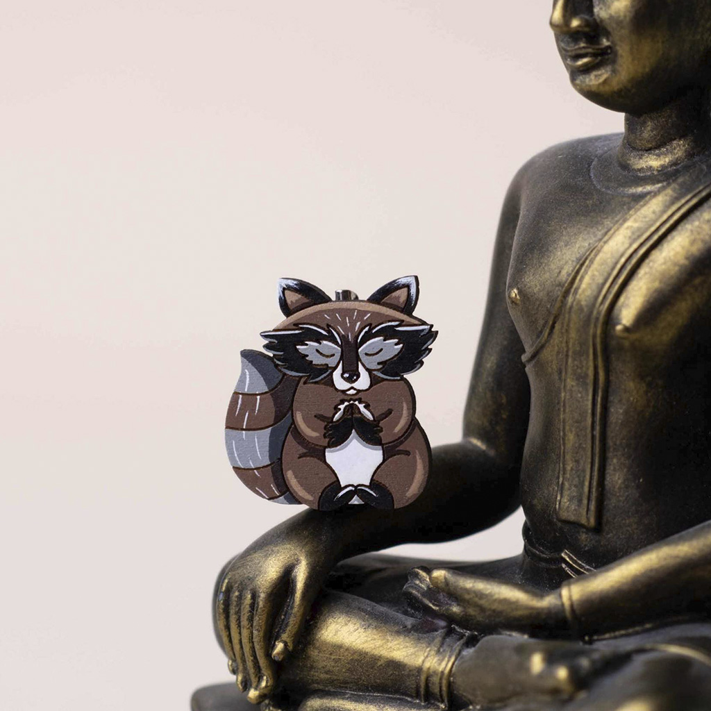 Значок "Енот медитирует"