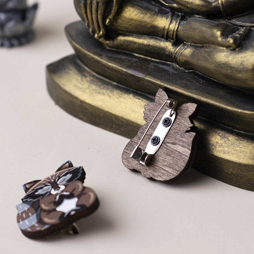 Значок "Енот медитирует"